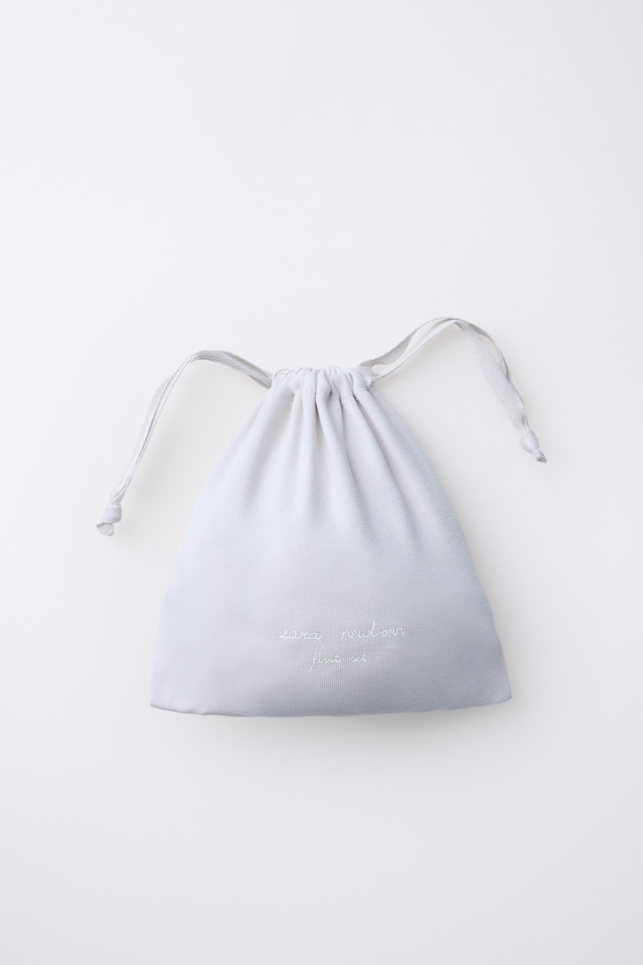 LAYETTE SET WITH POUCH