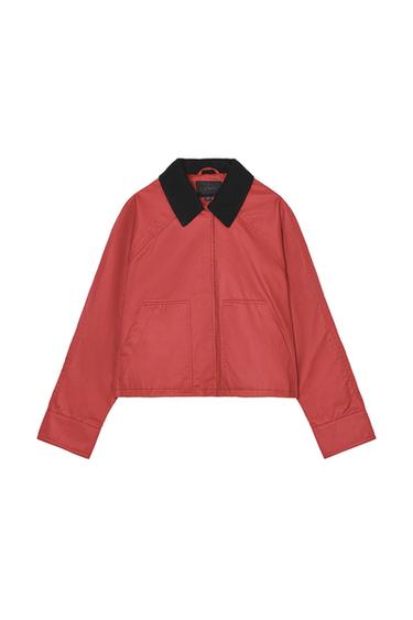 Front view of a red jacket with a black collar and side pockets.