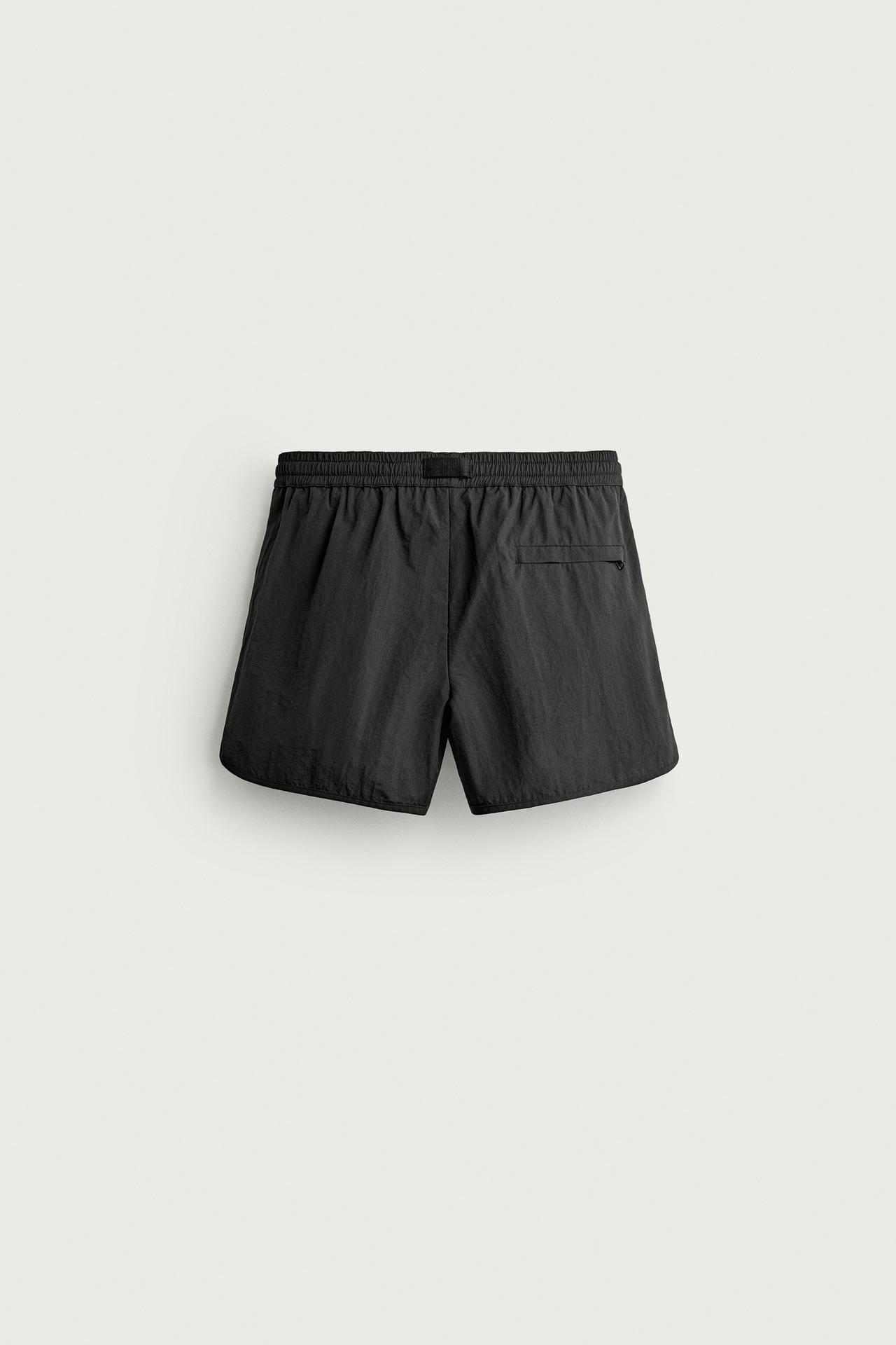TEXTURED SHORT SWIM SHORTS — Black