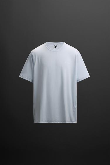 PERFORATED TRAINING T-SHIRT WITH PRINT - Light sky blue by Zara