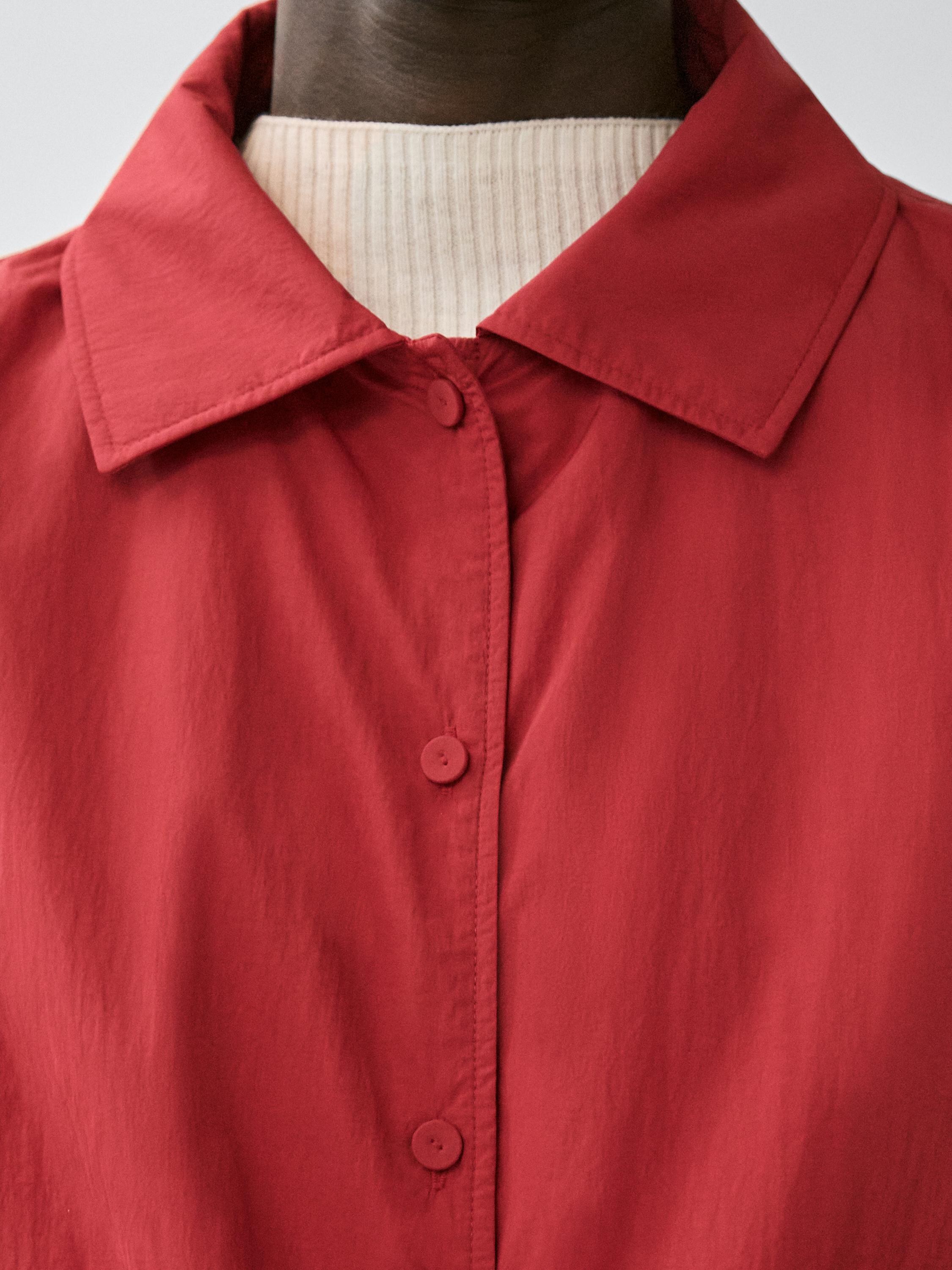 Short padded jacket with pockets