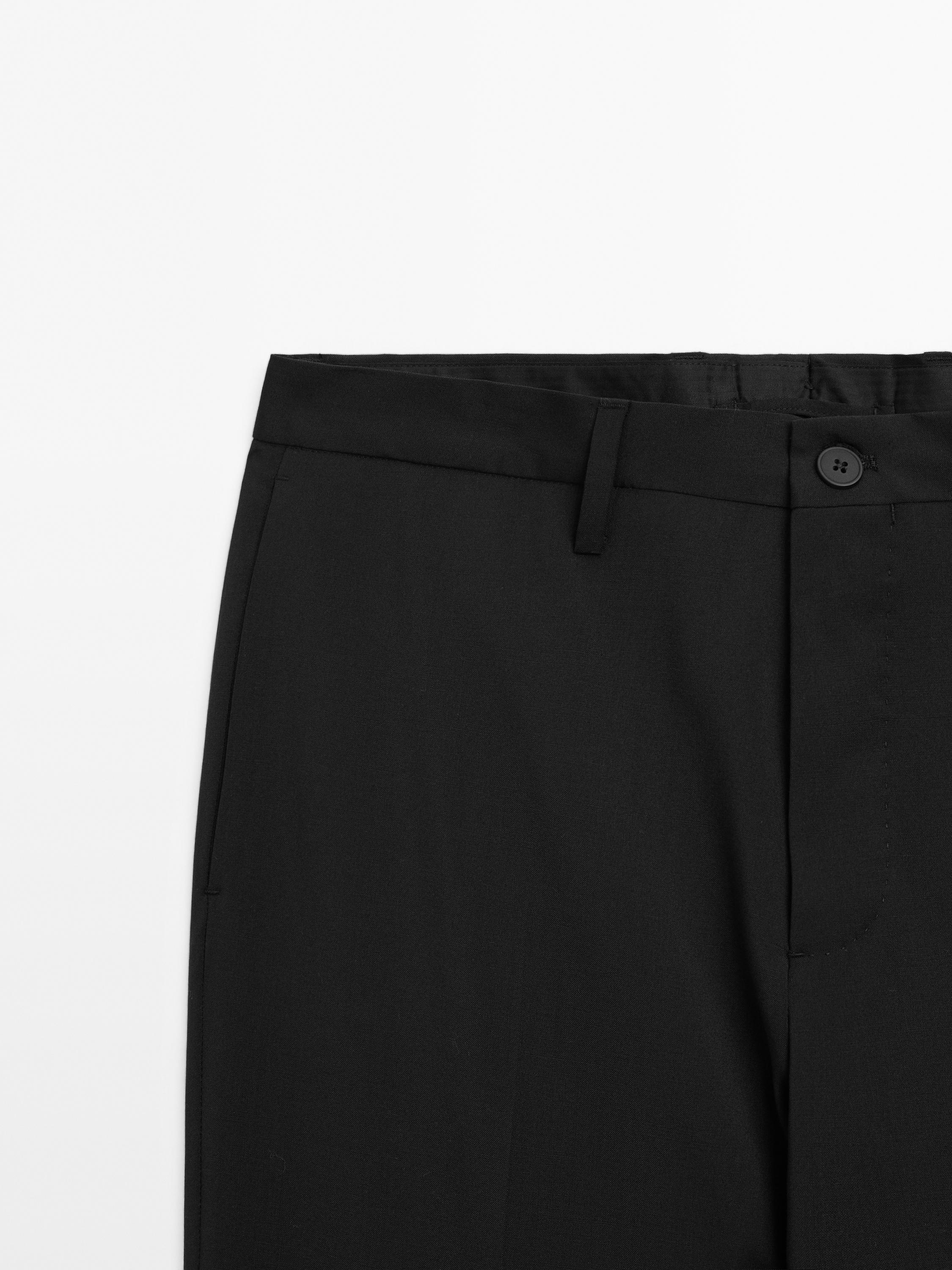 Pantalon de costume uni 100 % laine