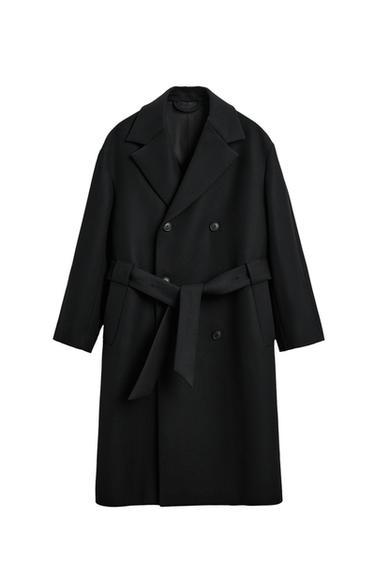Front view of a black, double-breasted coat with belt.
