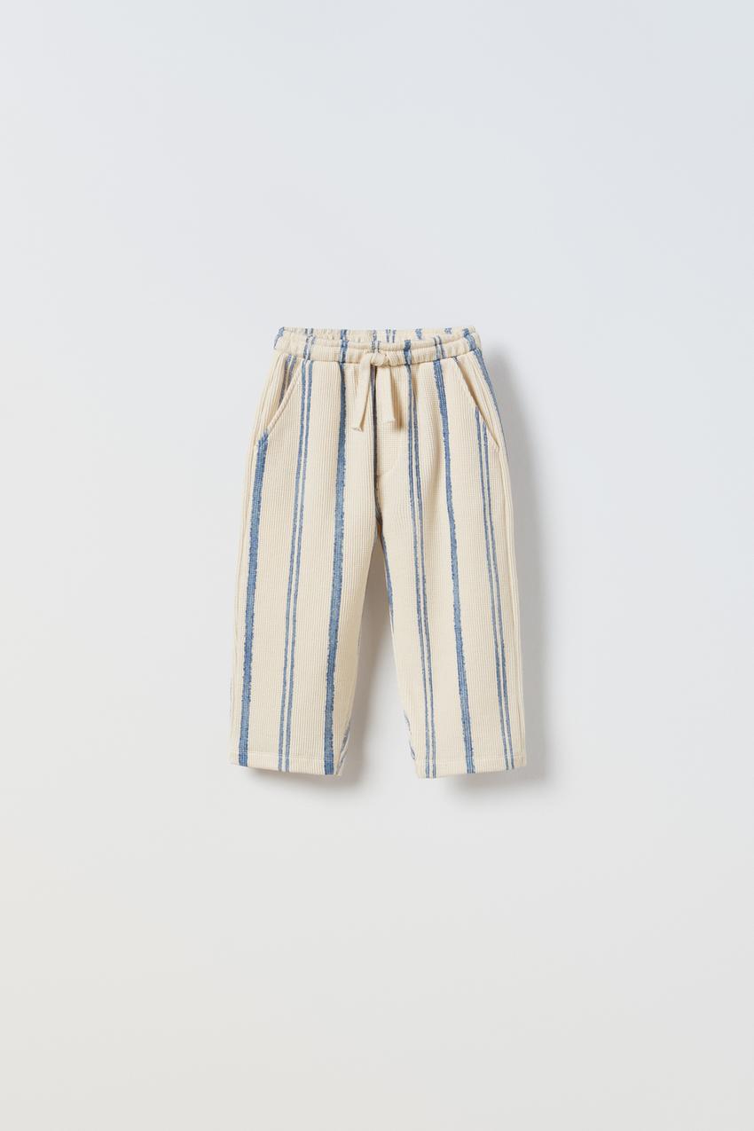 STRIPED WAFFLE-KNIT TROUSERS - Mid-blue
