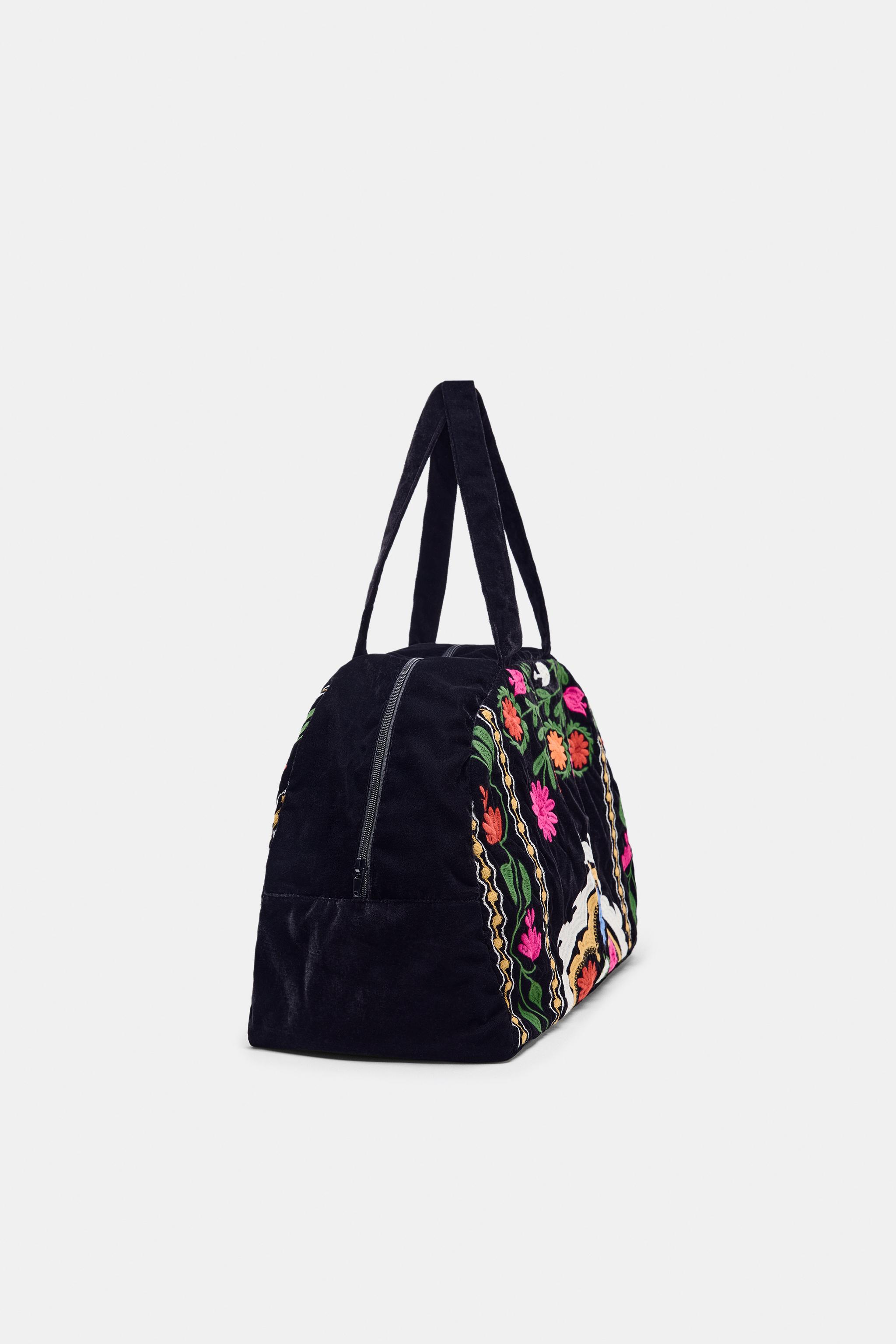EMBROIDERED VELVET TRAVEL BAG