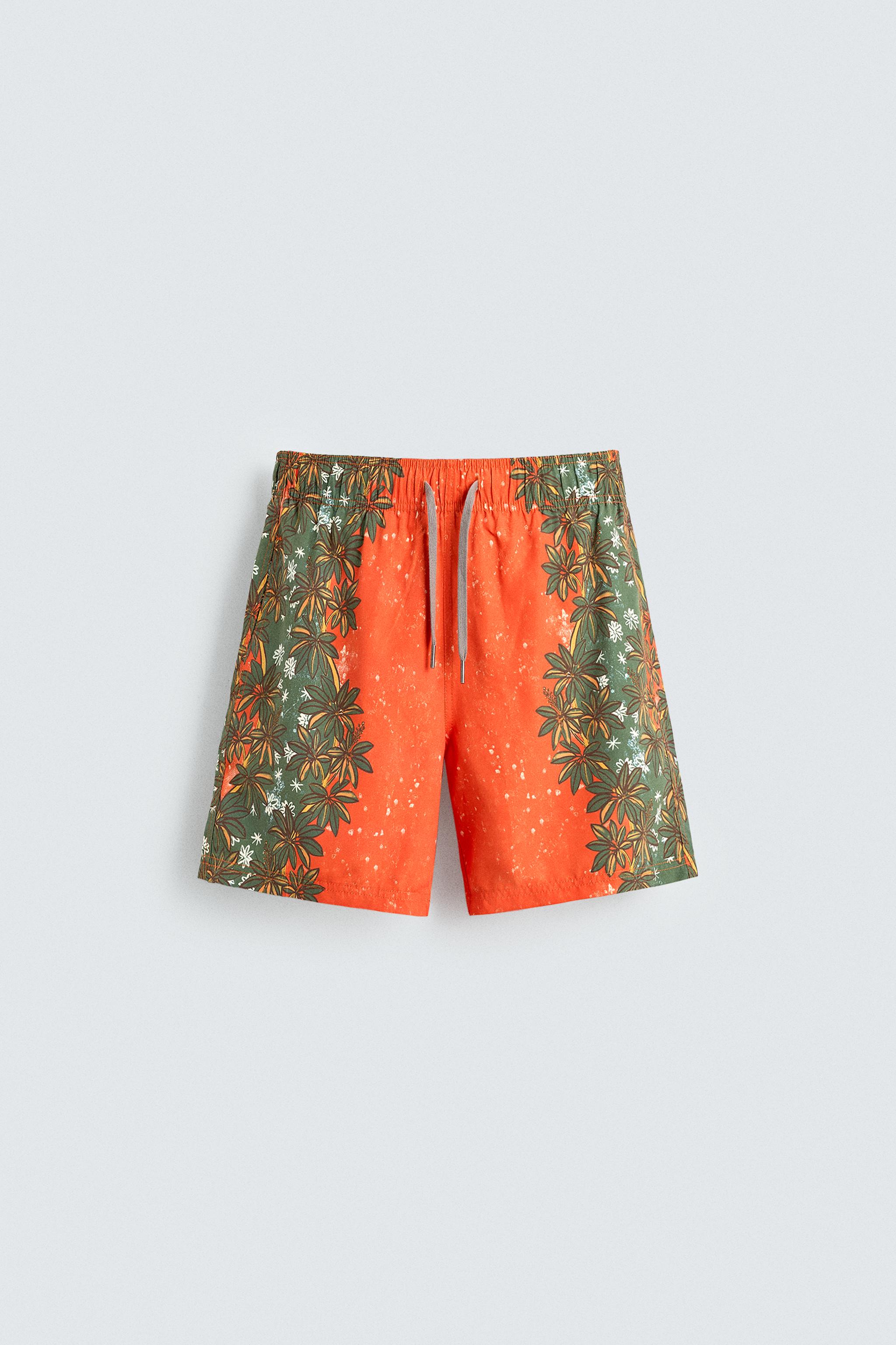 LONG FLORAL PRINT SWIM TRUNKS
