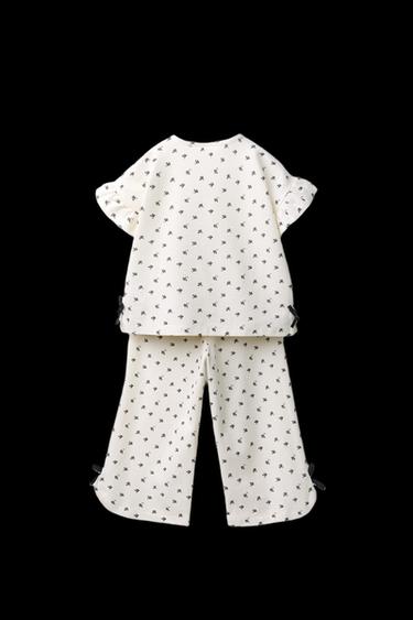 CONJUNTO CAMISETA Y PANTALÓN ESTAMPADO FLORES Y LAZOS - Crudo de Zara