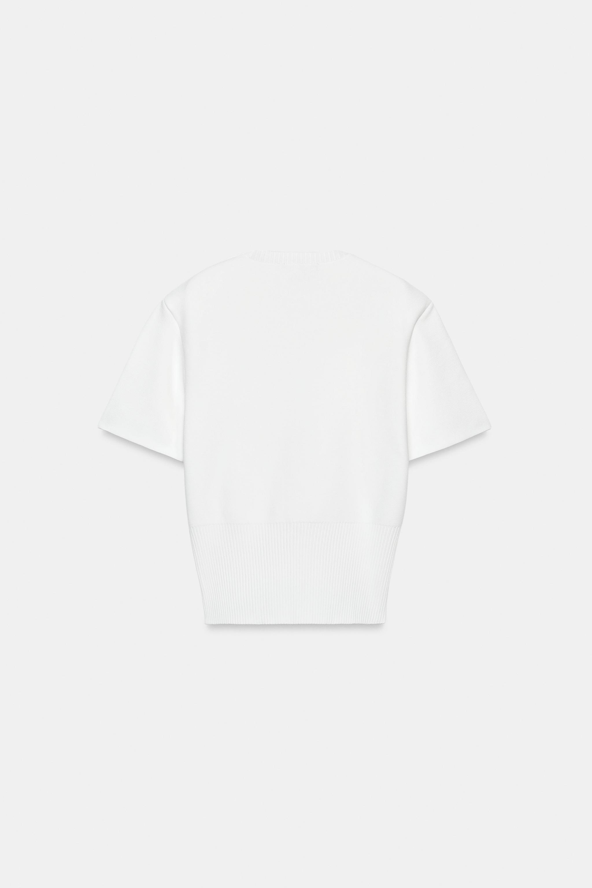 TOP EN MAILLE À ÉPAULETTES