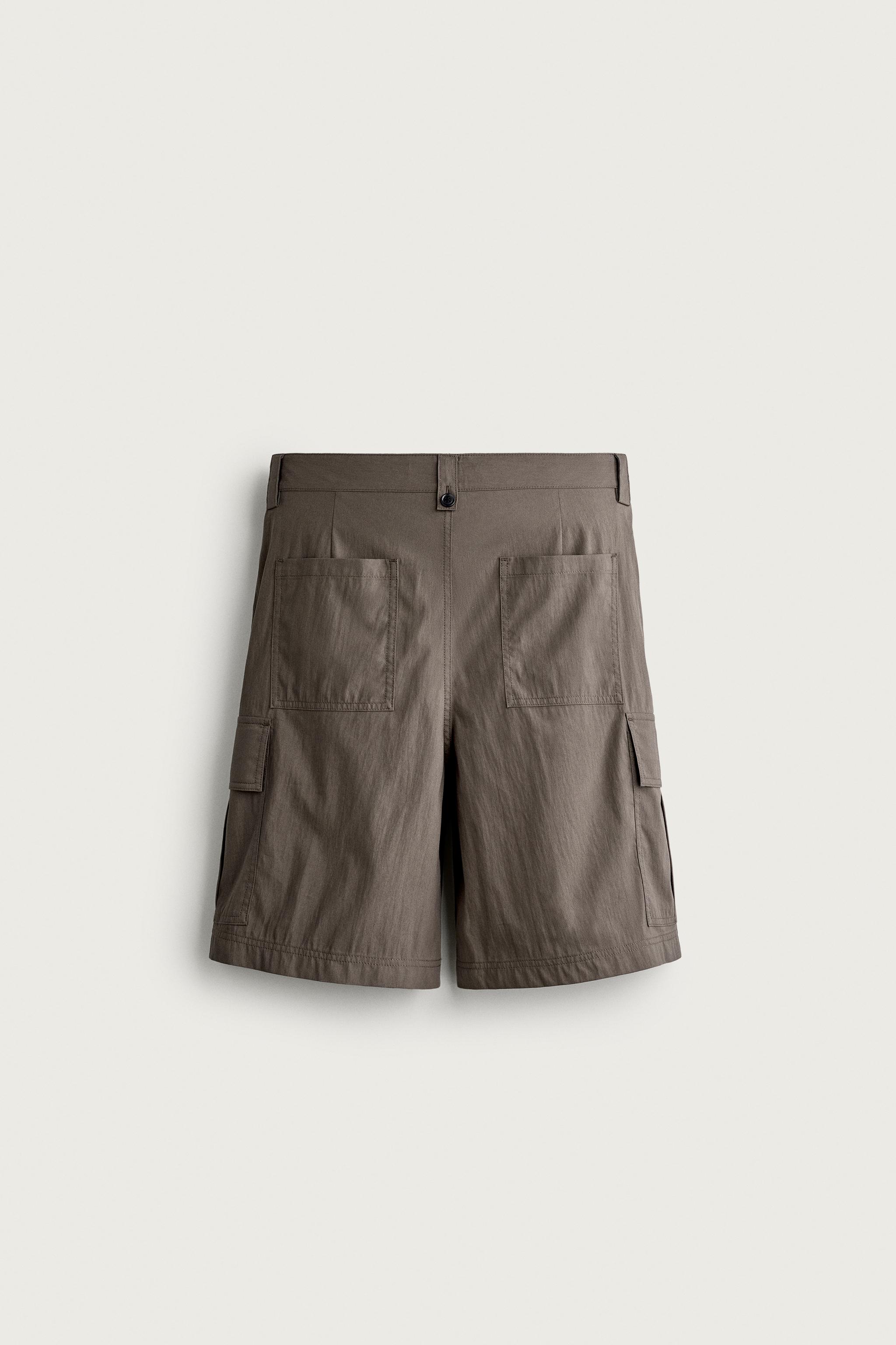 RELAXED FIT PLEATED CARGO SHORTS