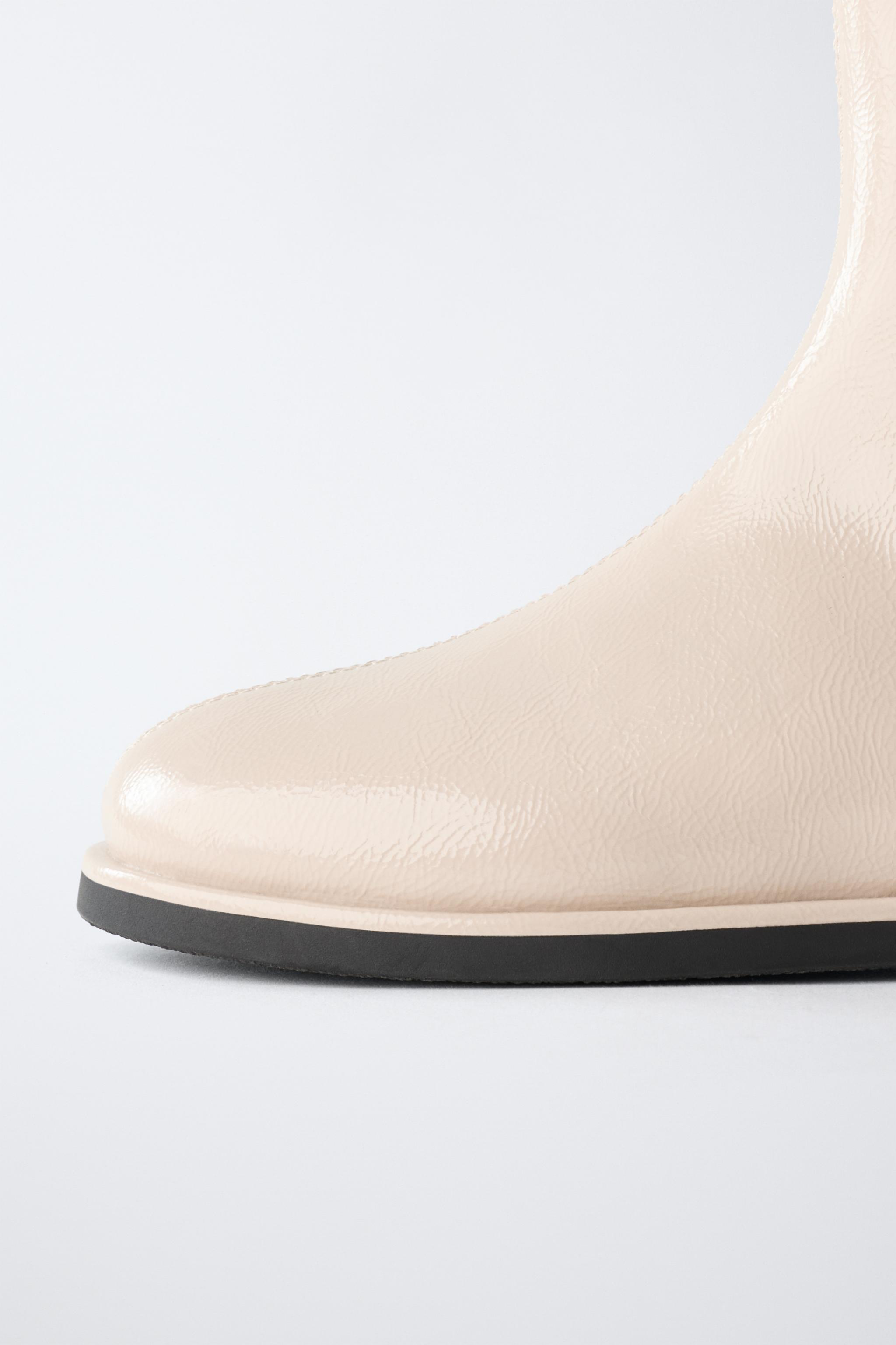 PATENT FINISH ANKLE BOOTS ECRU