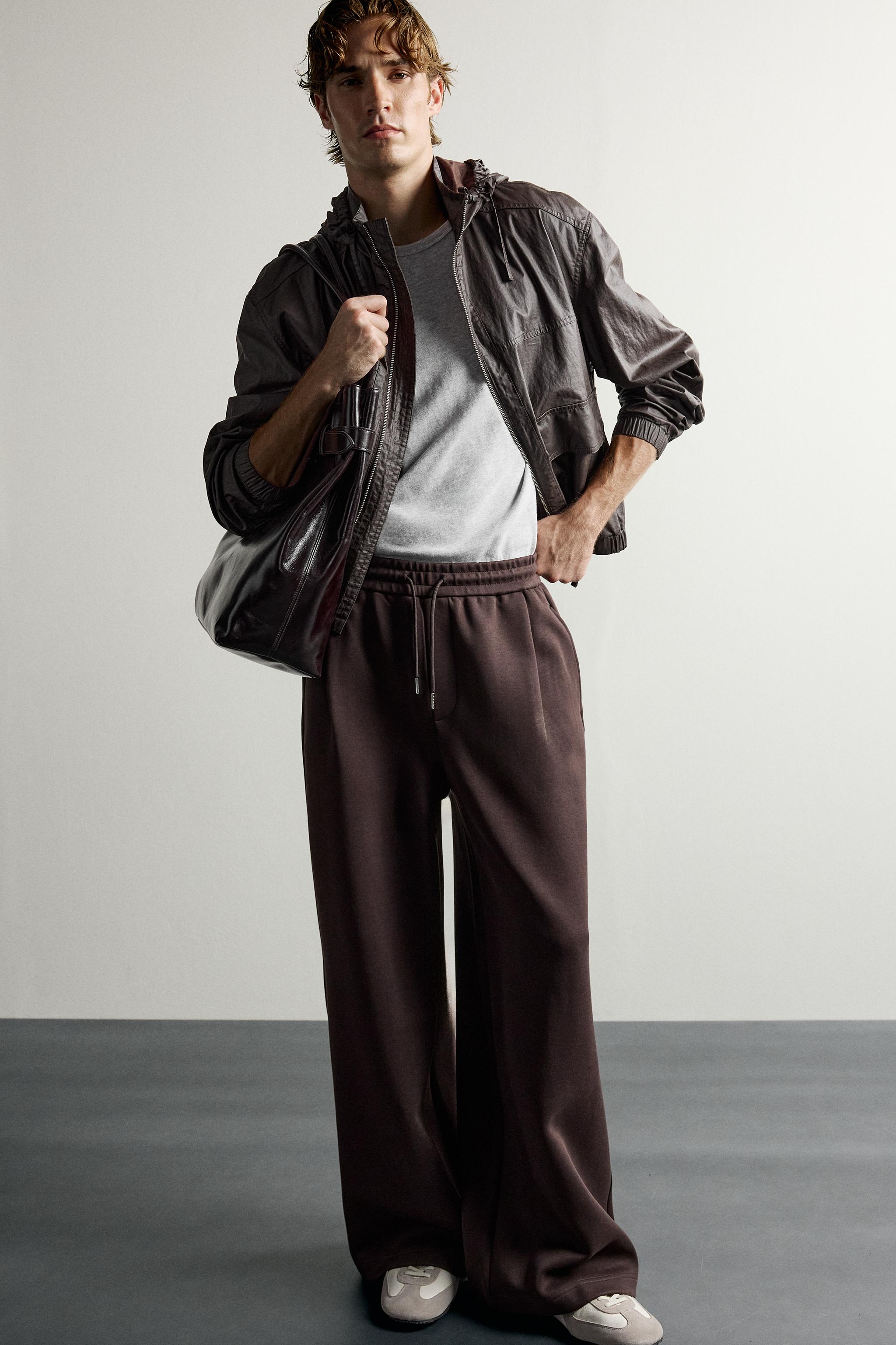 PLEATED BALLOON-FIT PANTS