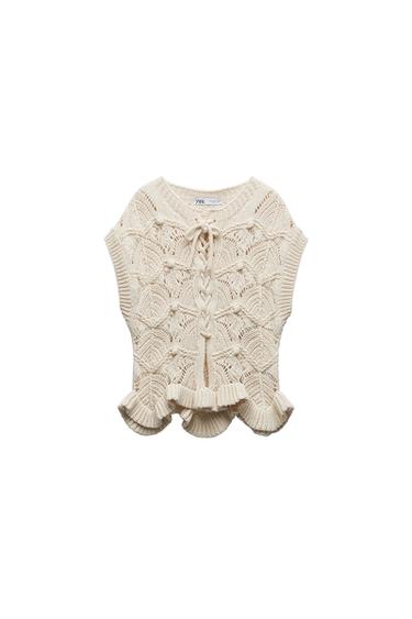 RUFFLED KNIT TOP WITH DRAWSTRINGS