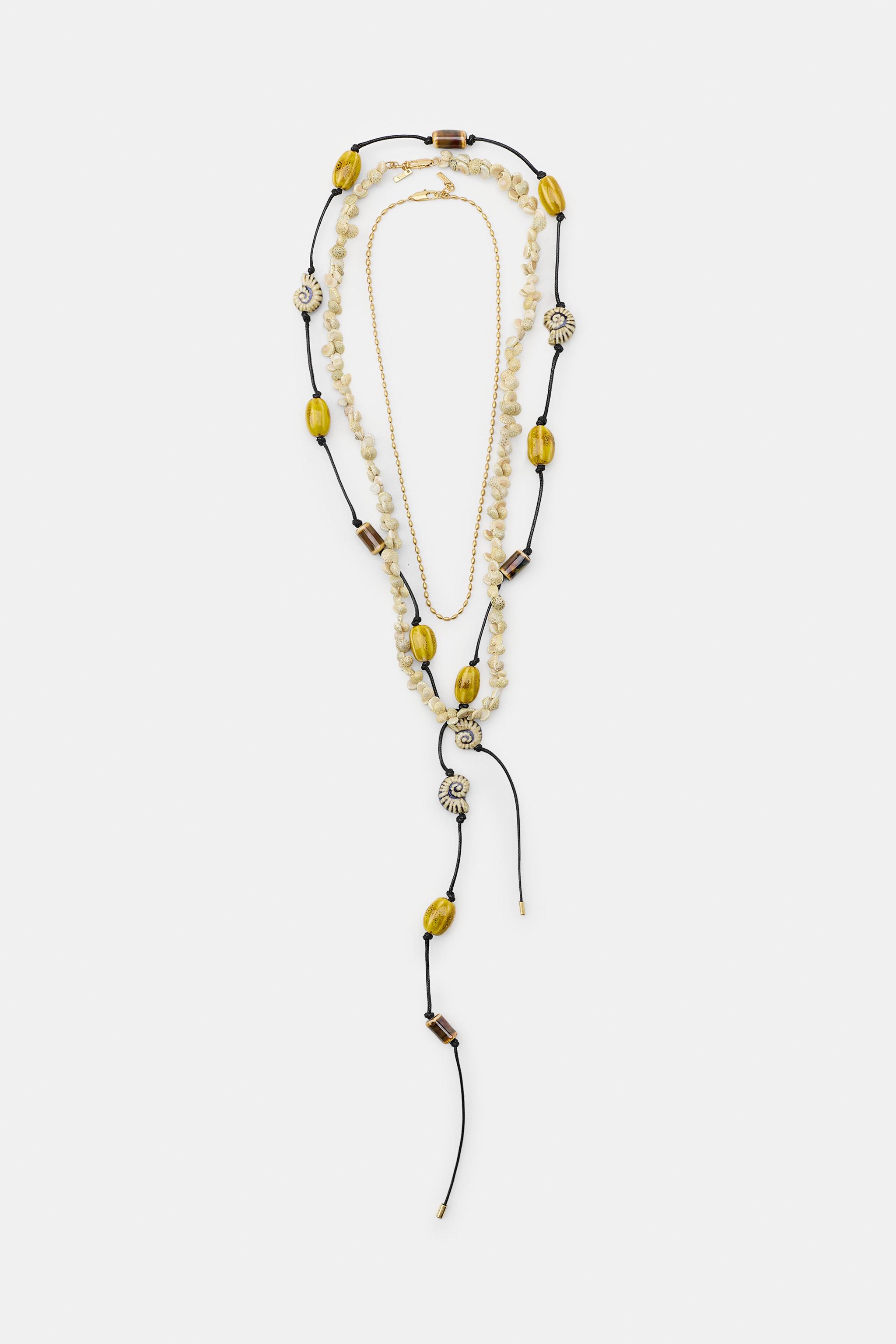 PACK OF 3 CORD NECKLACES WITH SHELLS AND CERAMIC