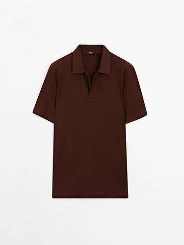 Polo botón oculto estructura - Cobre de Zara