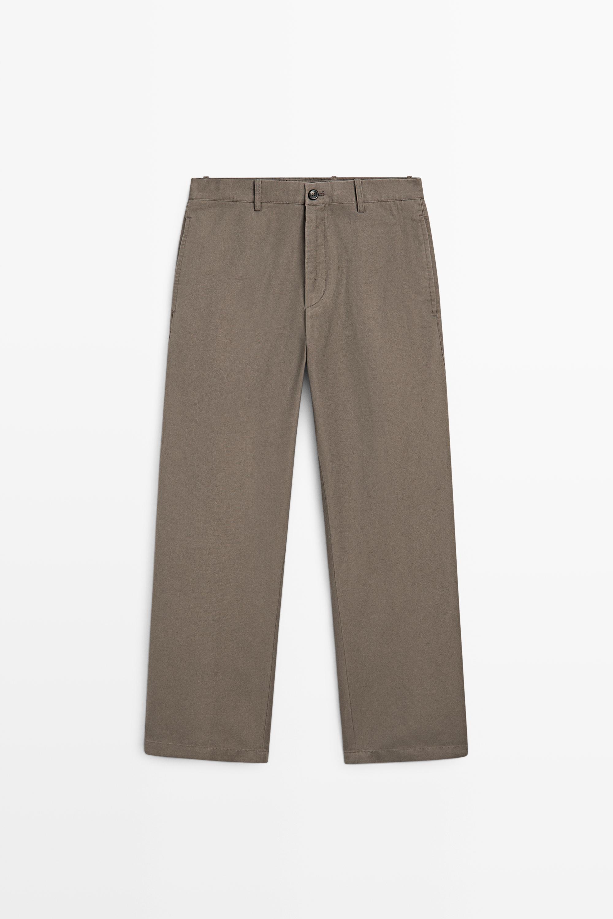 Cotton and linen tapered fit trousers — Black gold