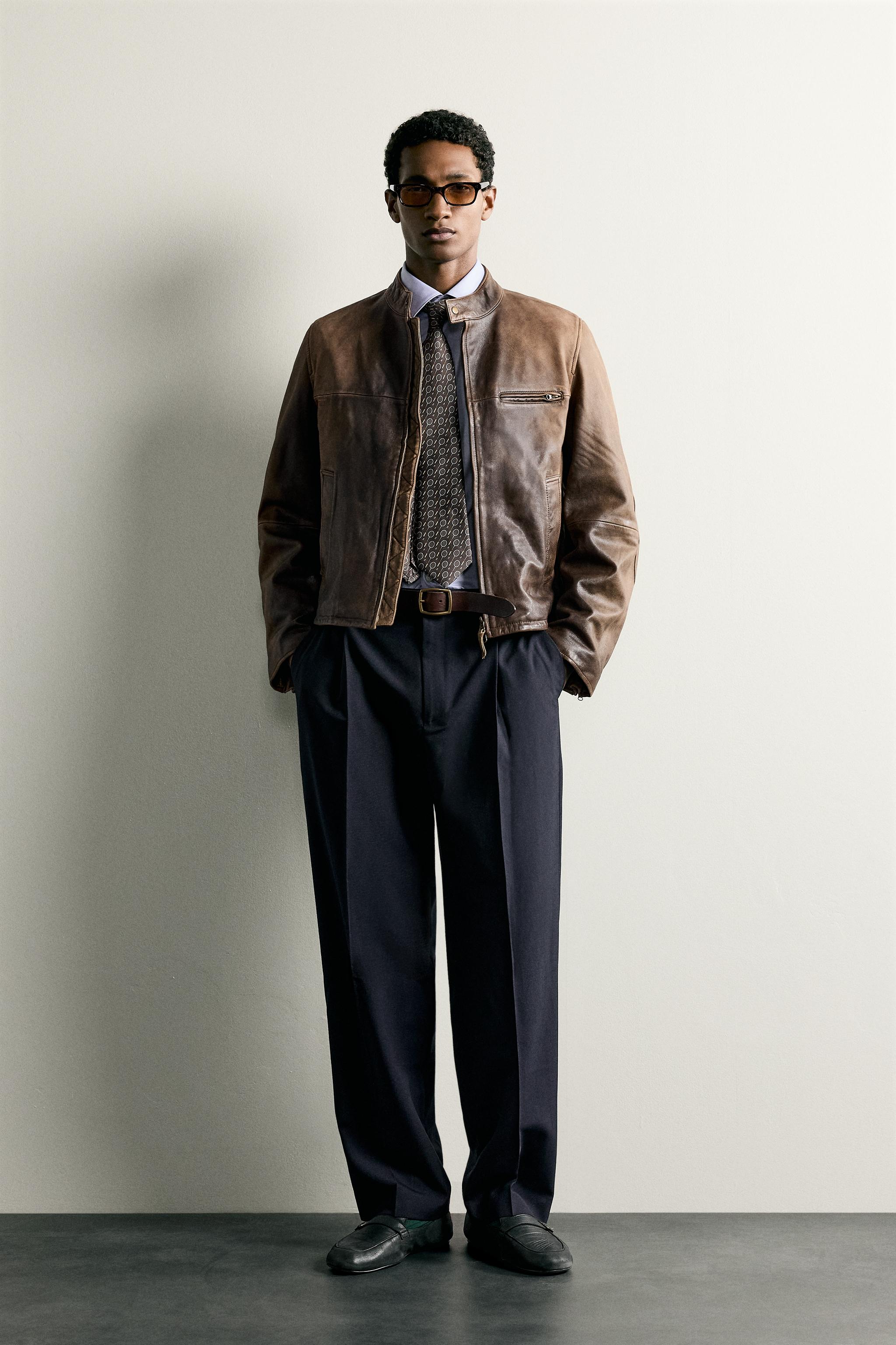 RELAXED FIT PLEATED PANTS