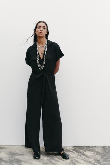 JUMPSUIT BAHAN JATUH BERKANTONG - Hitam dari Zara