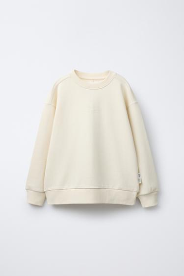 PLAIN SWEATSHIRT WITH RAISED SLOGAN - Light yellow by Zara
