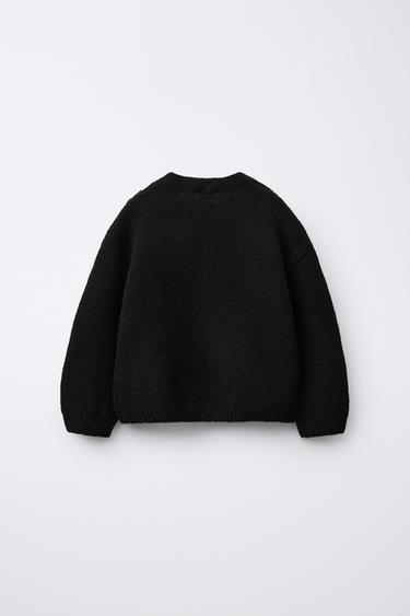 PULL EN MAILLE À FLEURS - Noir de Zara - Image 1