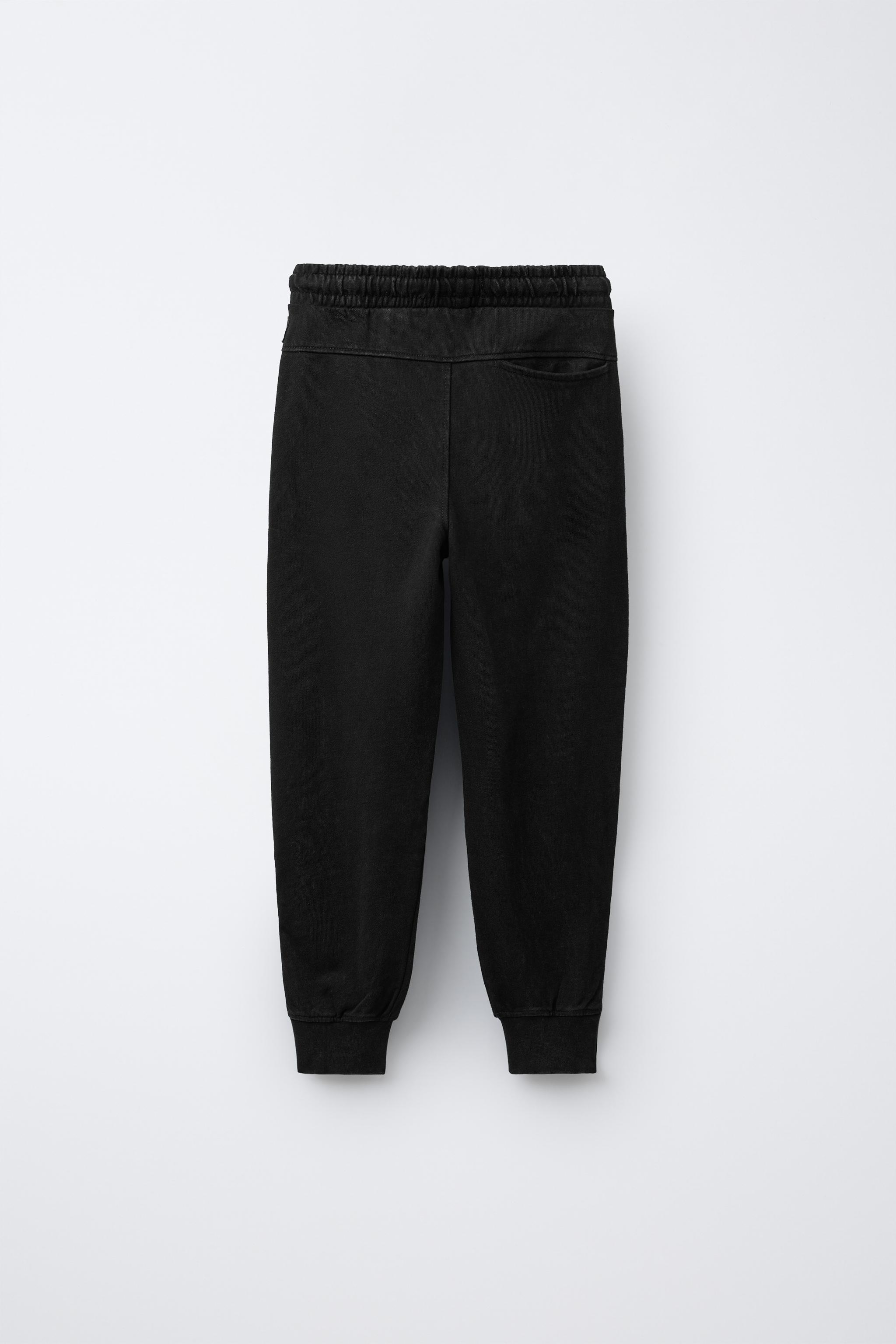PANTALON JOGGER ZIPPÉ
