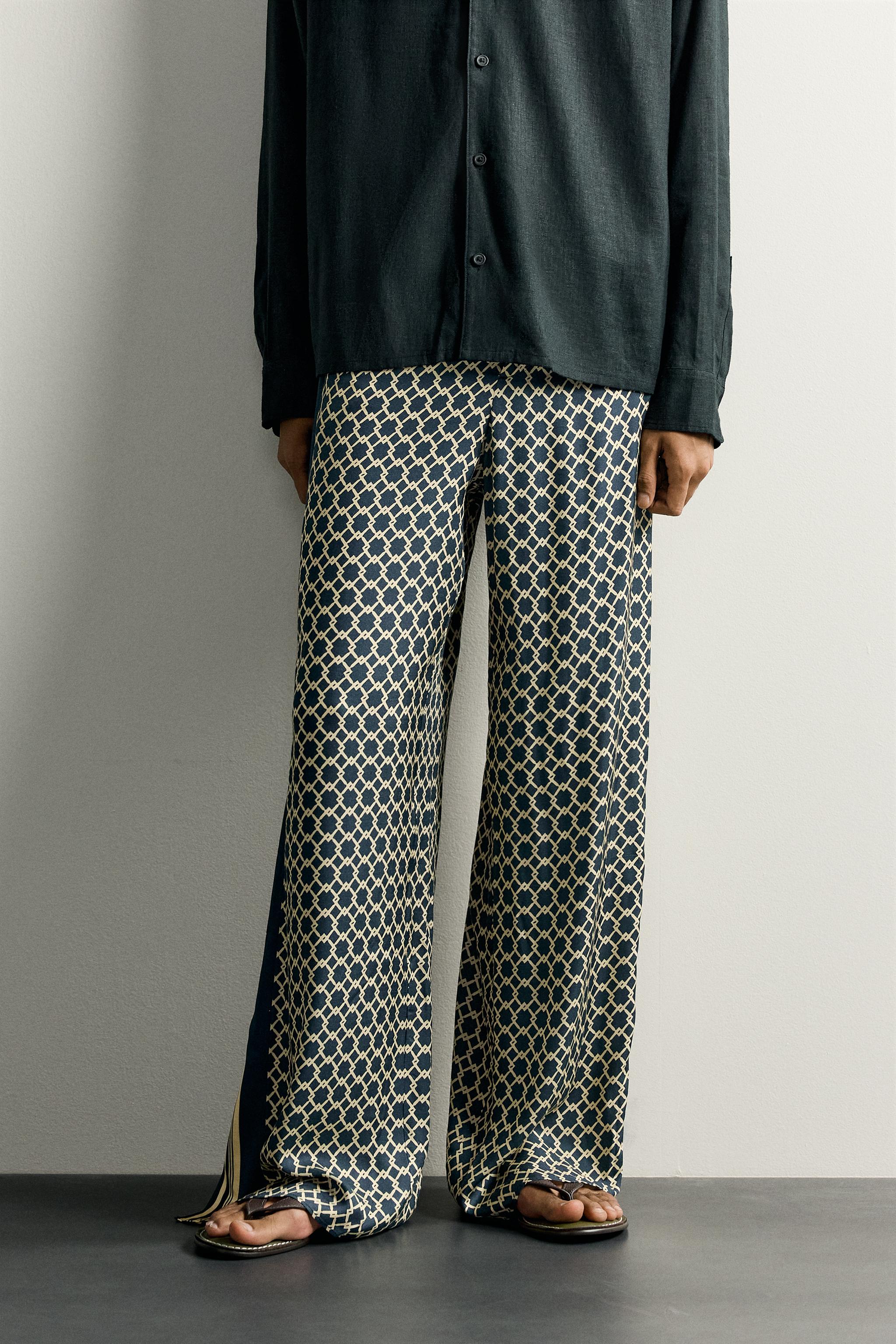 LIMITED EDITION FLOWY PANTS WITH SIDE BANDS