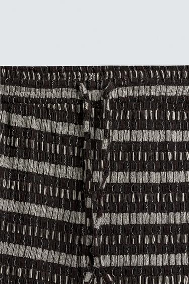 PANTALÓN JACQUARD CALADOS - Crudo / Marrón de Zara
