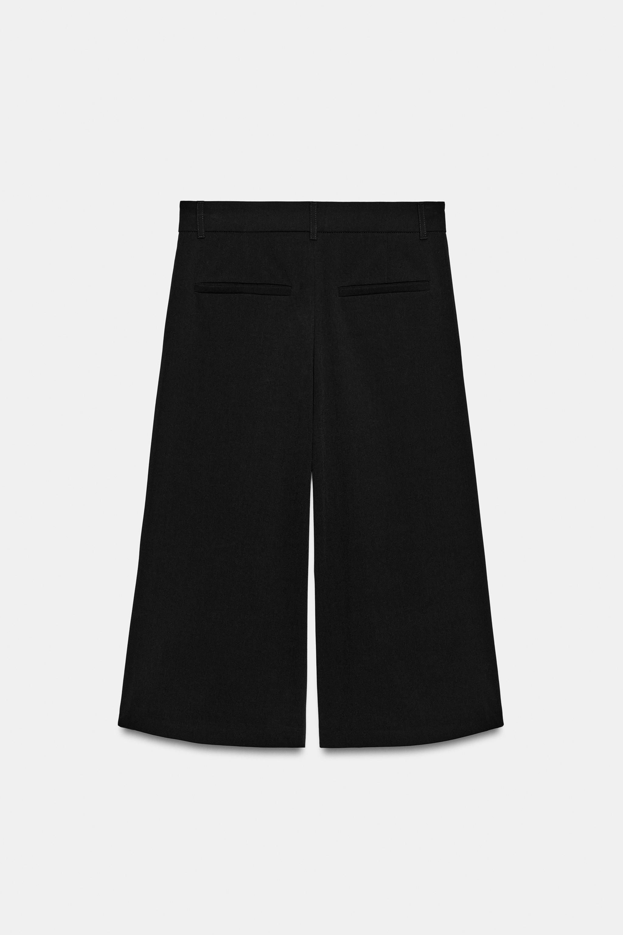 LONG PLEATED BERMUDA SHORTS