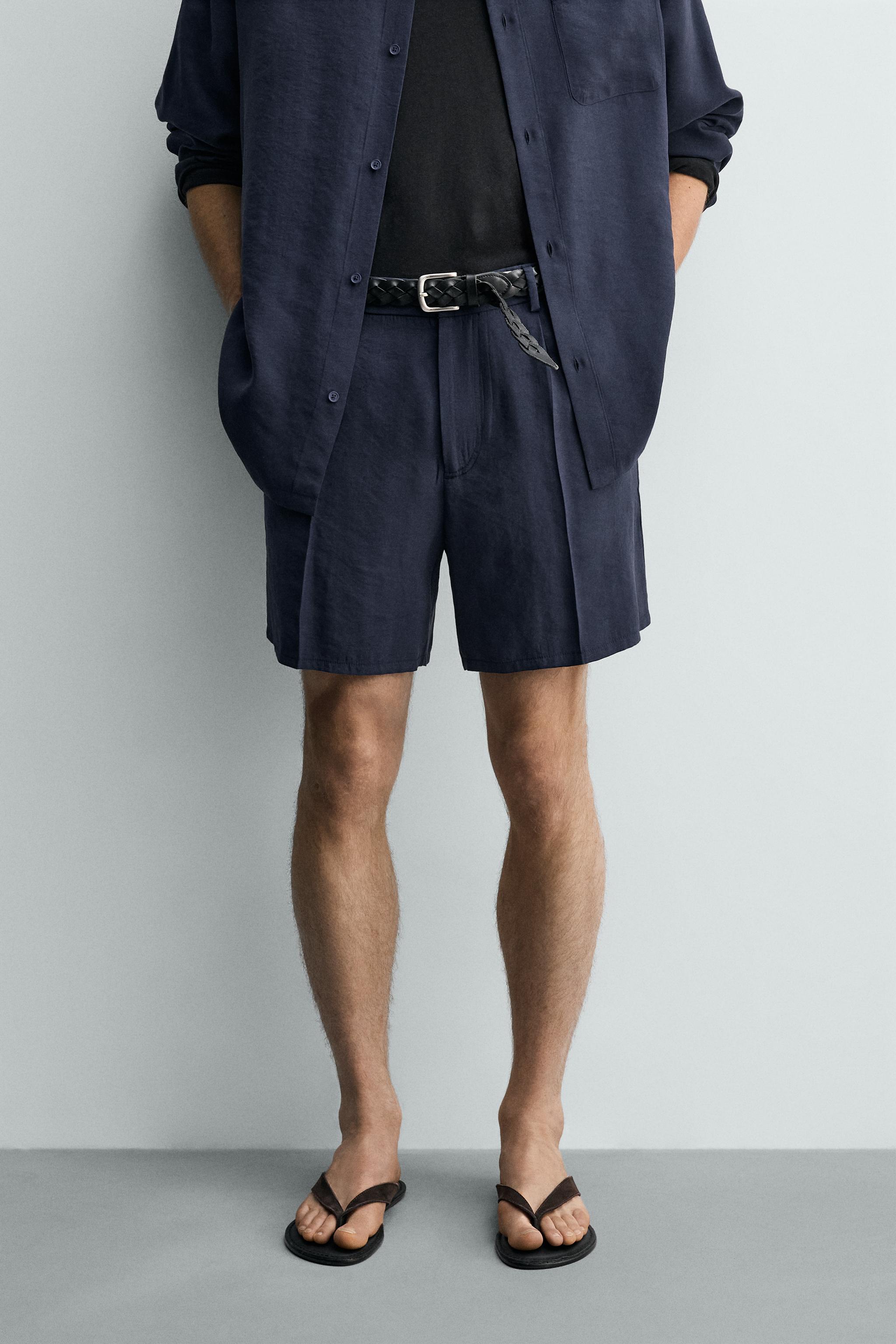 SOFT PLEATED LOOSE-FITTING BERMUDA SHORTS — Navy blue