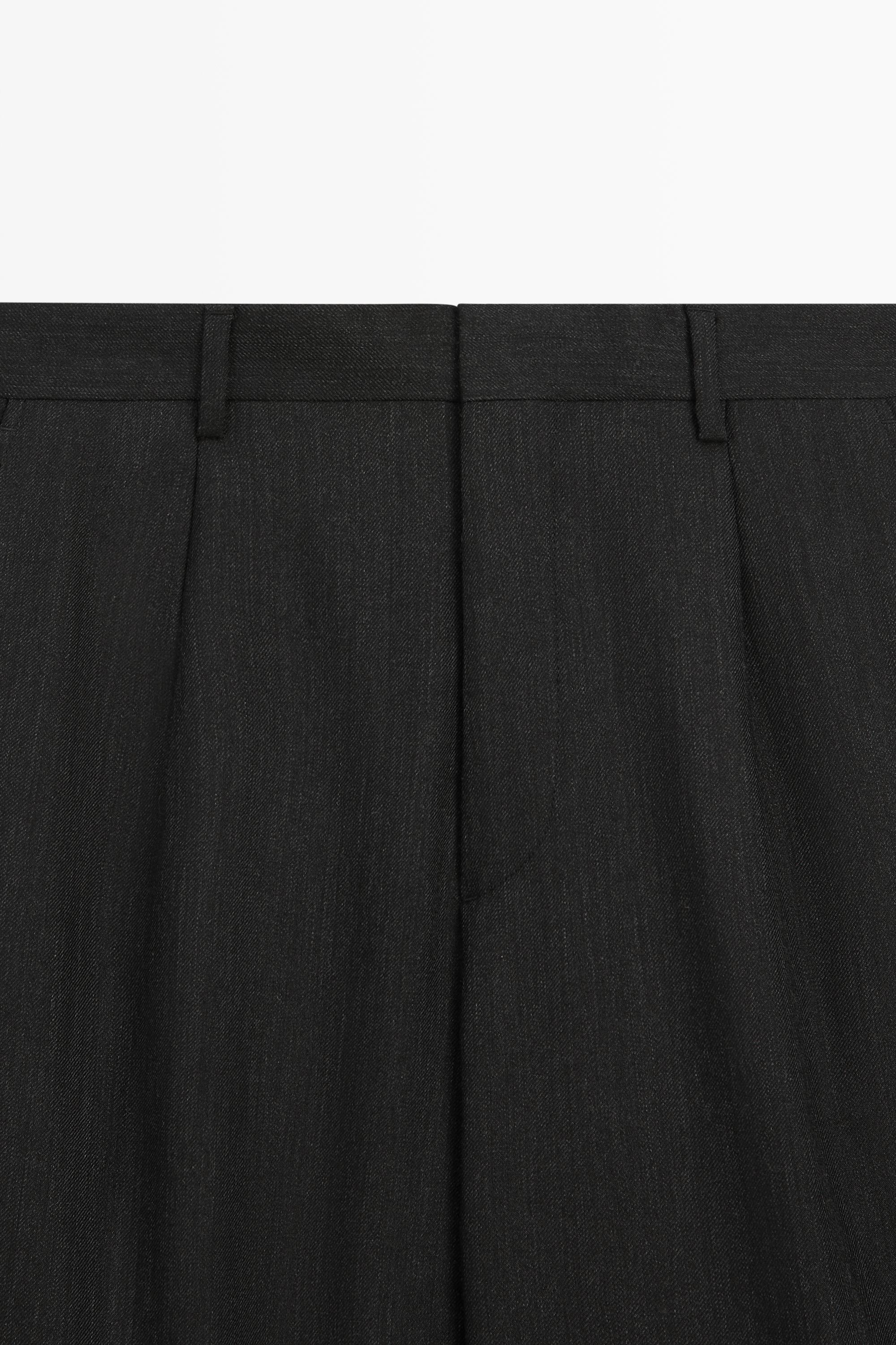 Pantalon relaxed fit en laine effet chiné