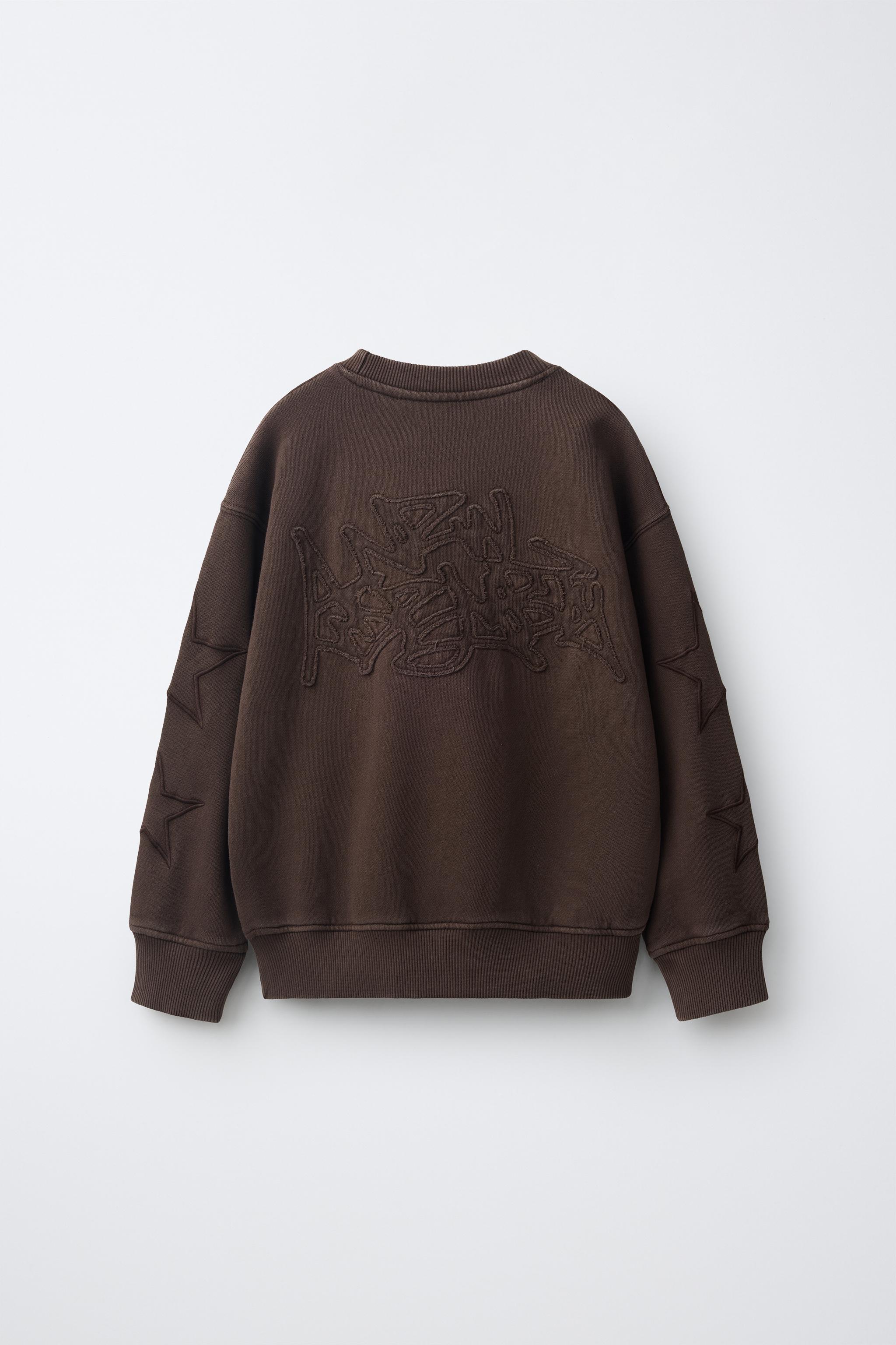 EMBROIDERED STAR TEXT SWEATSHIRT