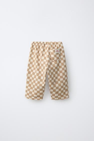 CHECKERBOARD PRINT BAGGY TROUSERS — camel 2