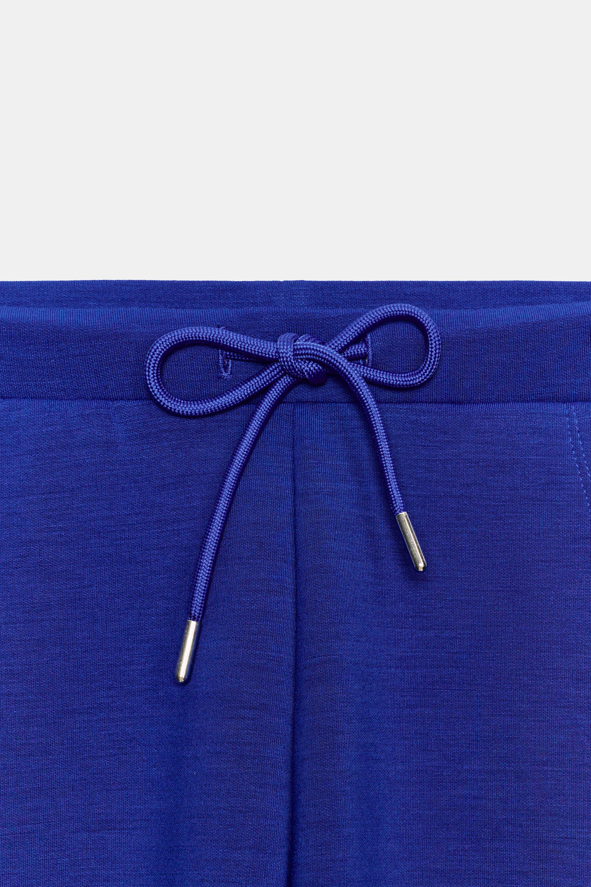 PANTALON FLARE INTERLOCK