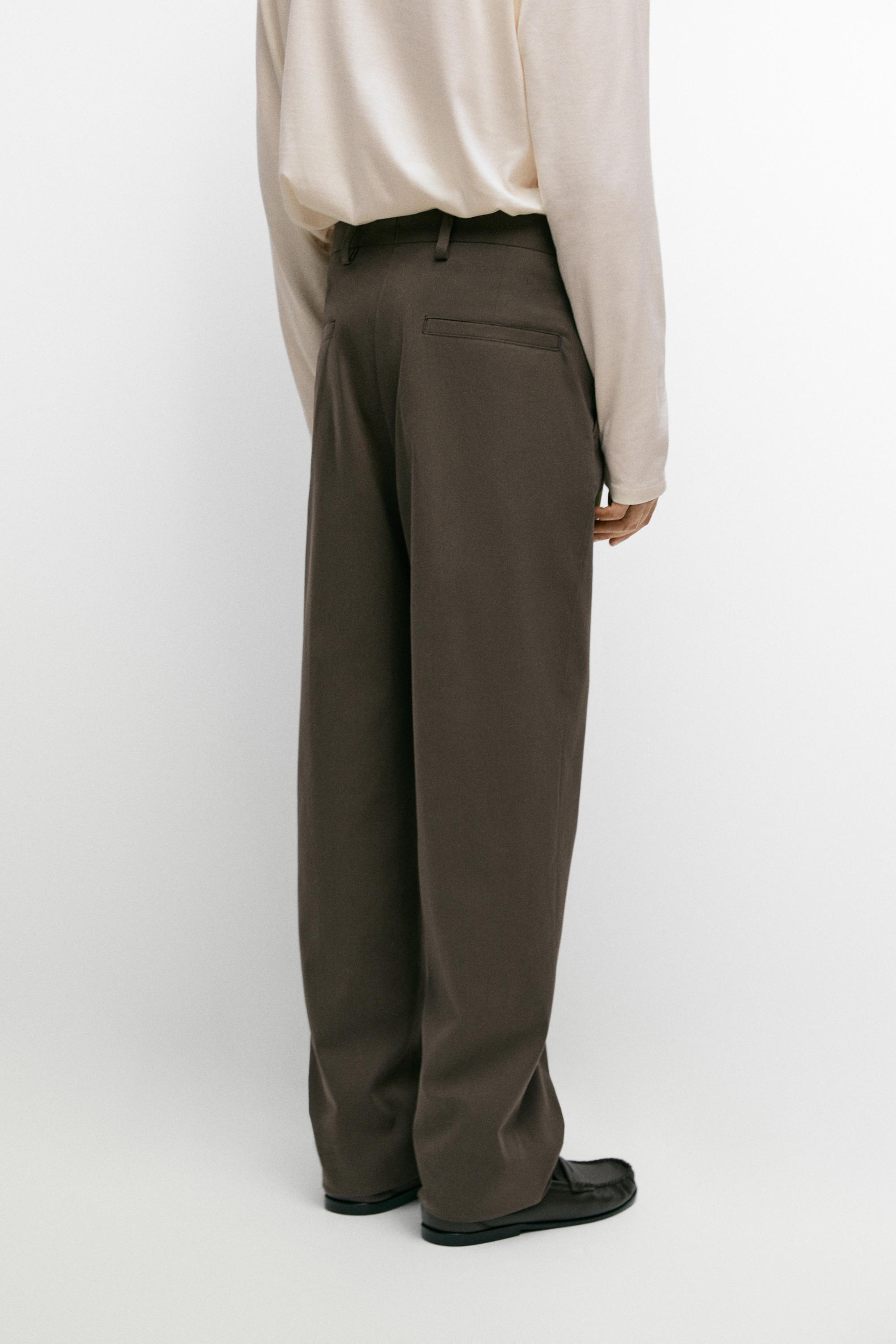 Pantalon jambe large à pinces en daim