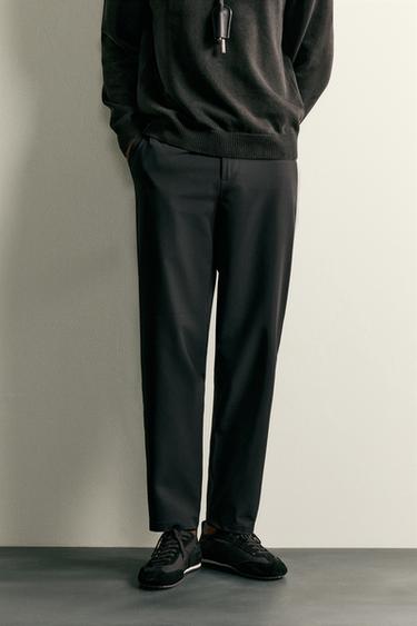 PANTALÓN TÉCNICO REGULAR FIT CONFORT - Negro de Zara