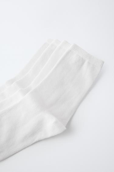 PACK CUATROS CALCETINES LARGOS - Blanco de Zara
