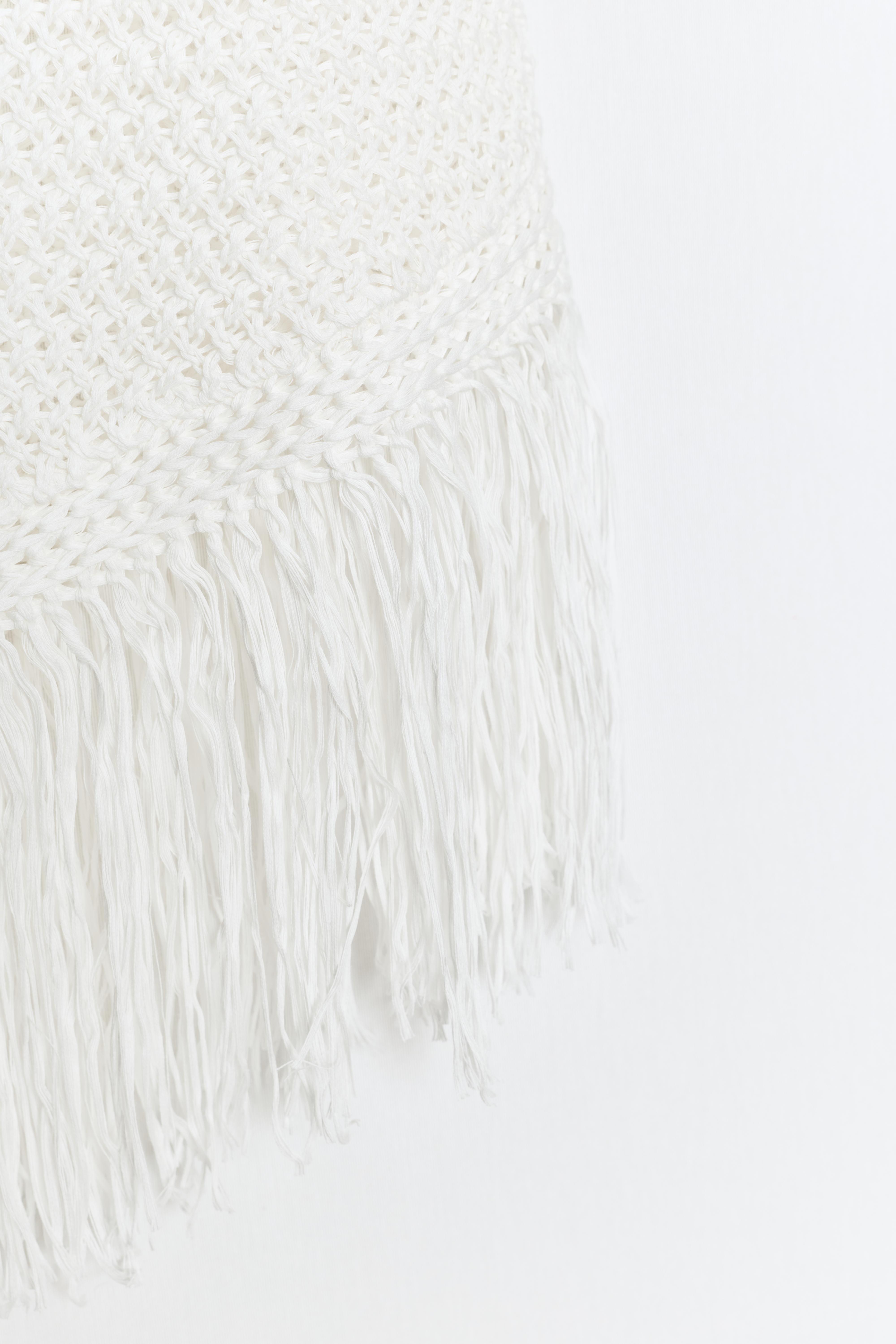 TOP EN MAILLE À FRANGES