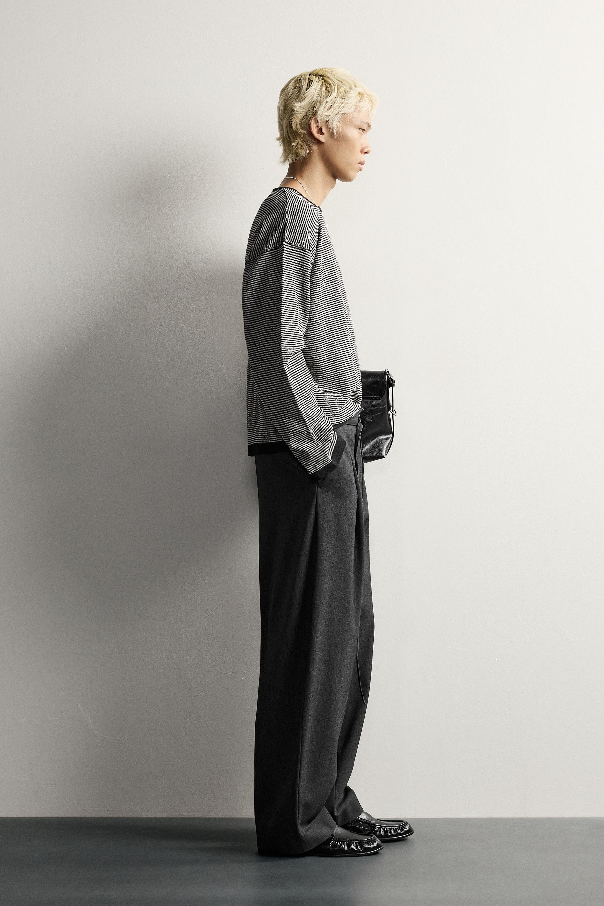 BELTED PLEATED BALLOON FIT PANTS