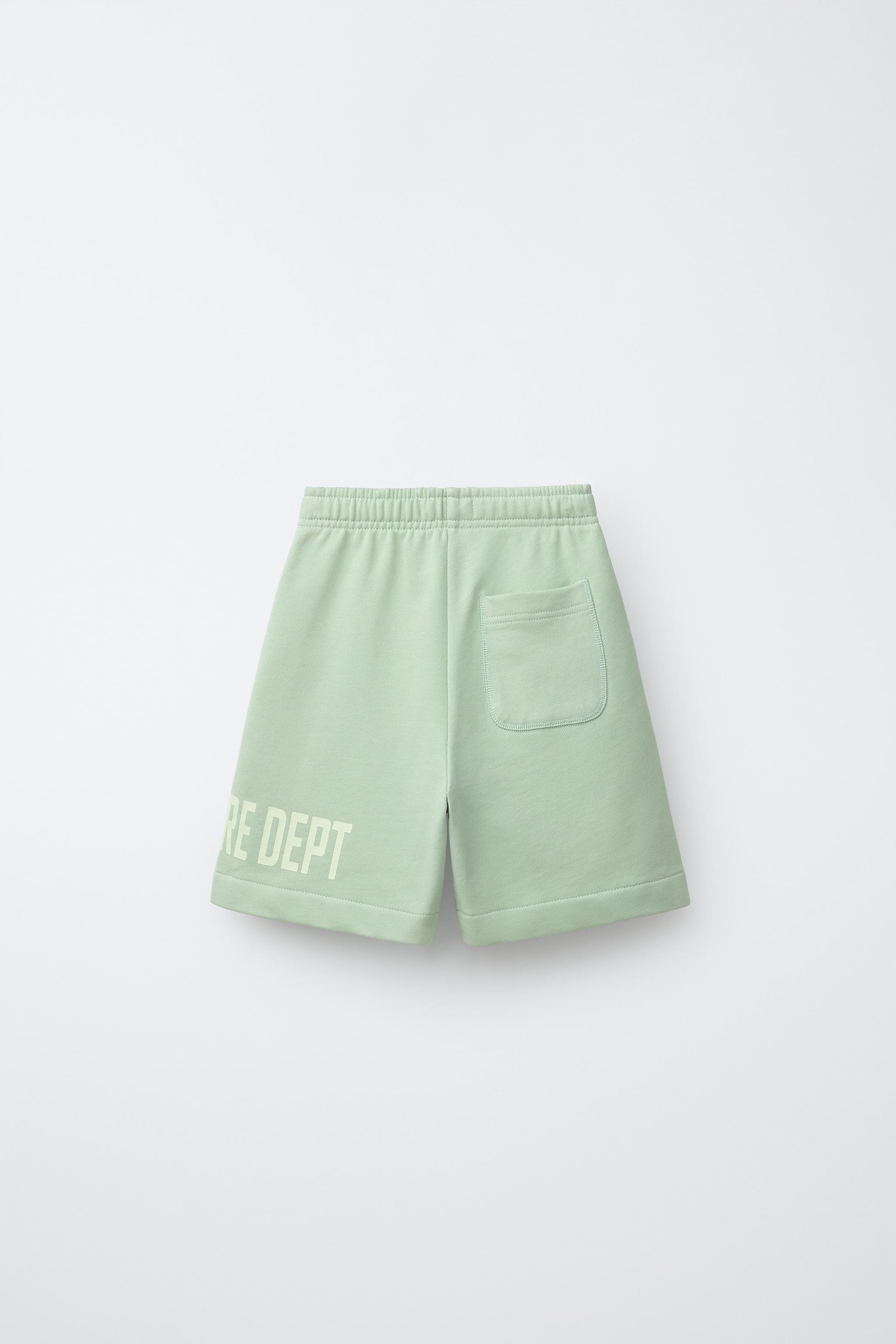 SHORT DE JOGGING À INSCRIPTION