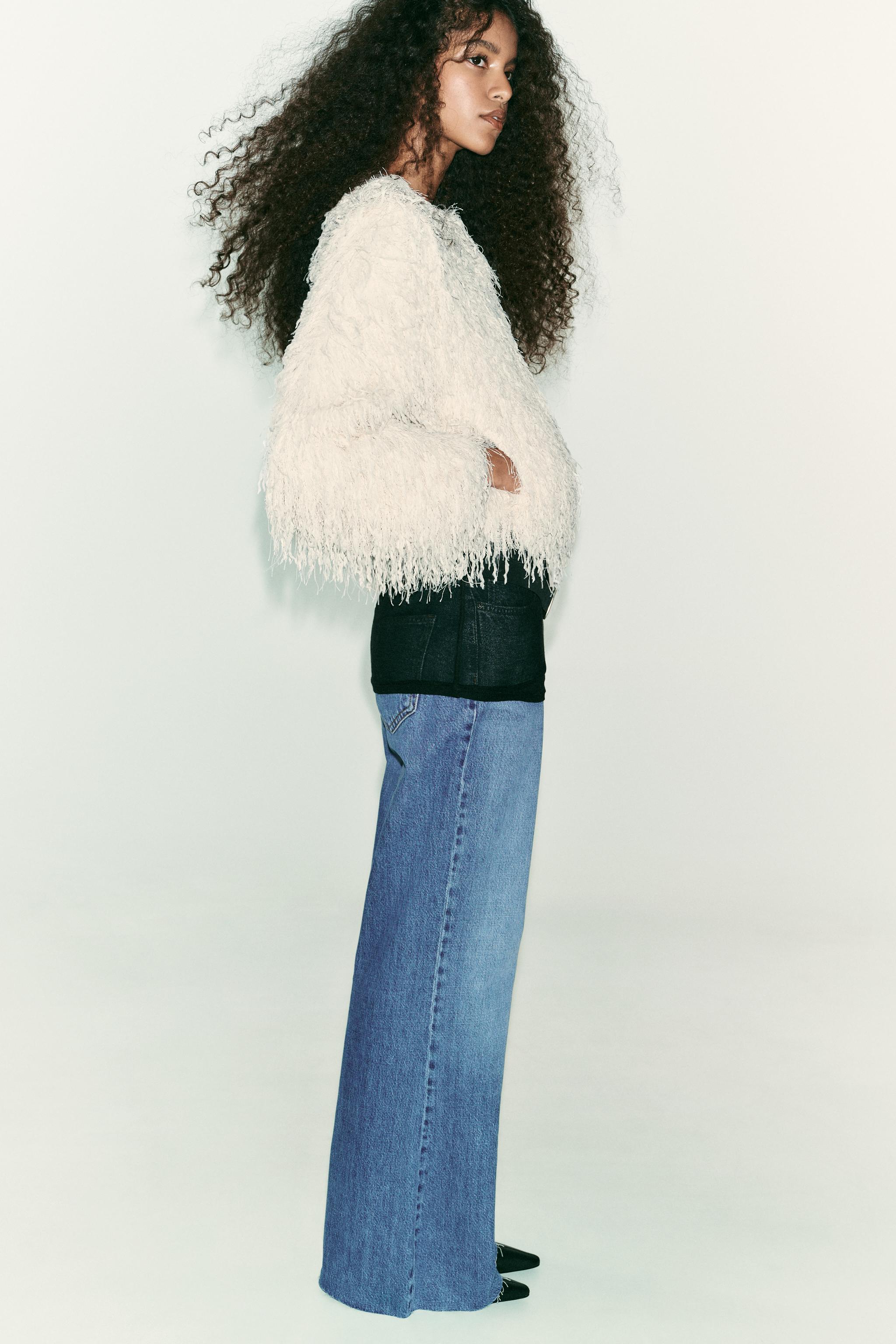 VESTE FRANGES PLUMES FIL MÉTALLISÉ