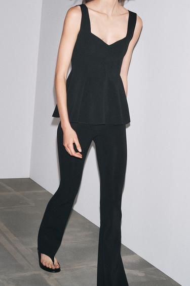 TOP PEPLUM STRETCH - أسود الخاص بـ Zara