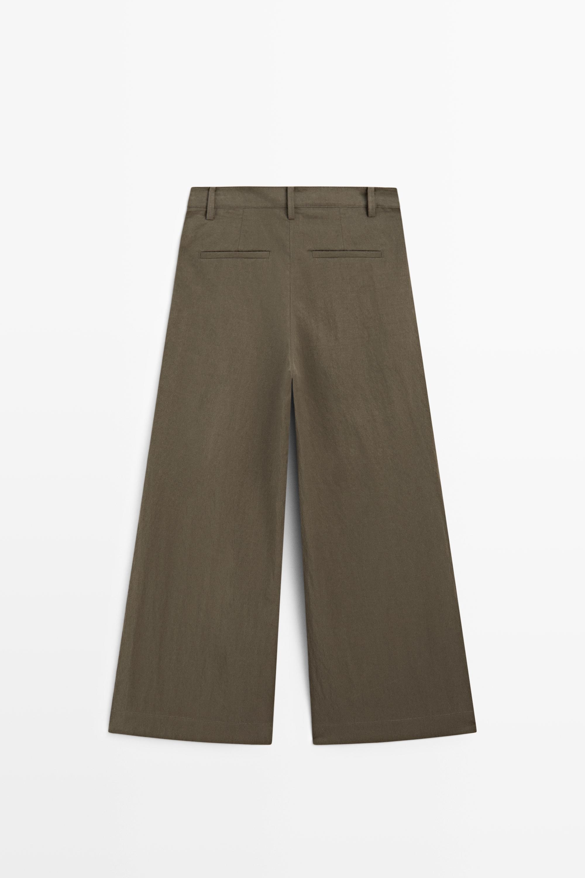 Technical wide-leg pleated pants