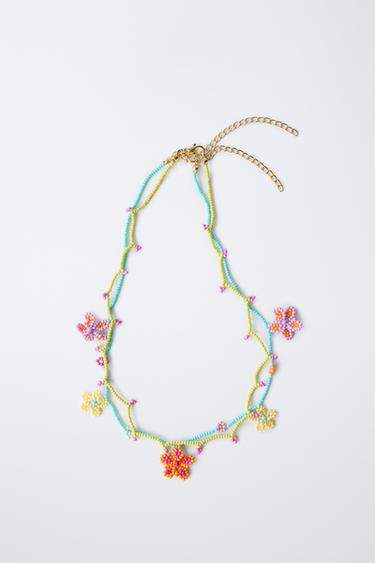 LOT DE DEUX COLLIERS FANTAISIE FLEURS - Fuchsia de Zara