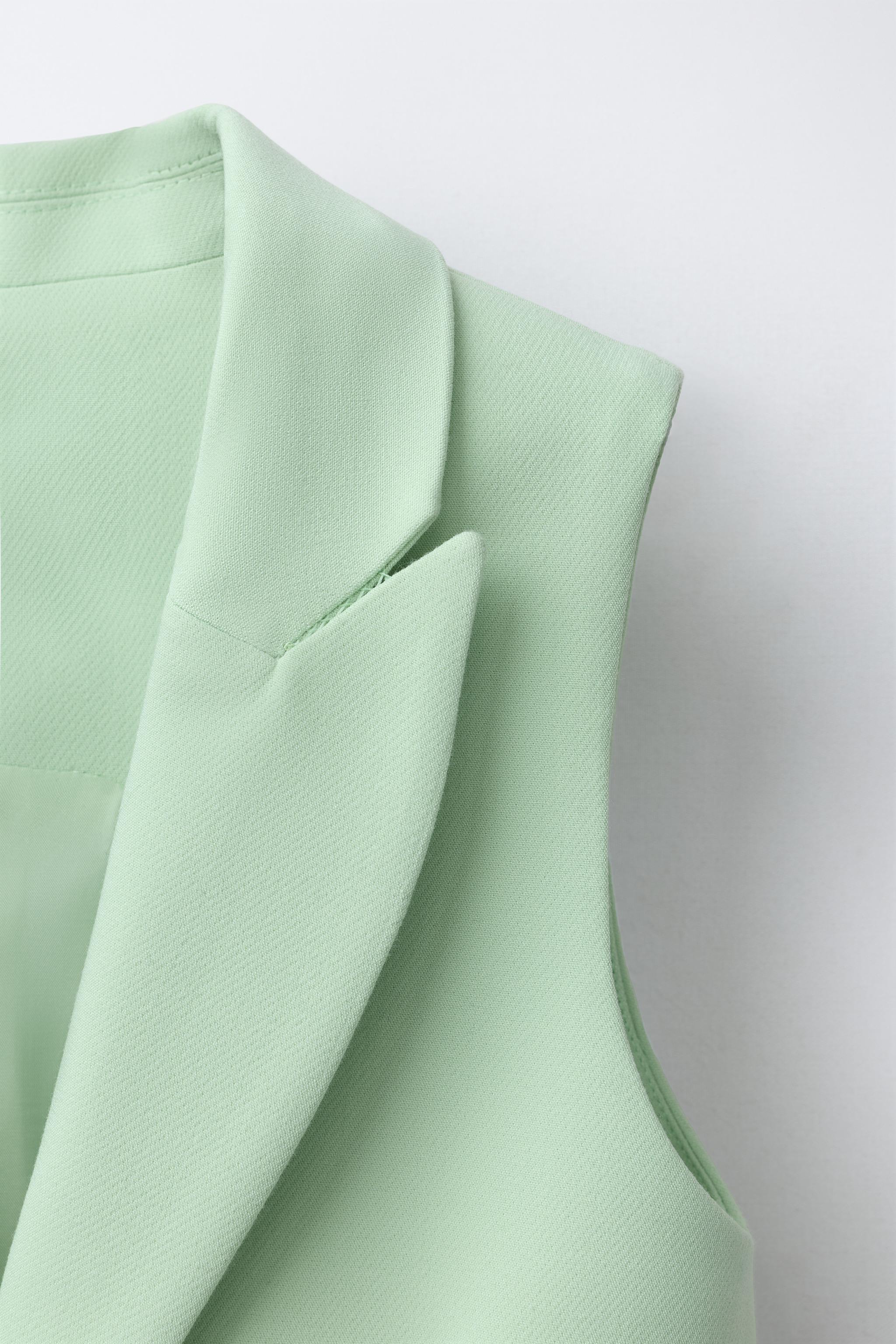 GILET LONG BOUTON BIJOU