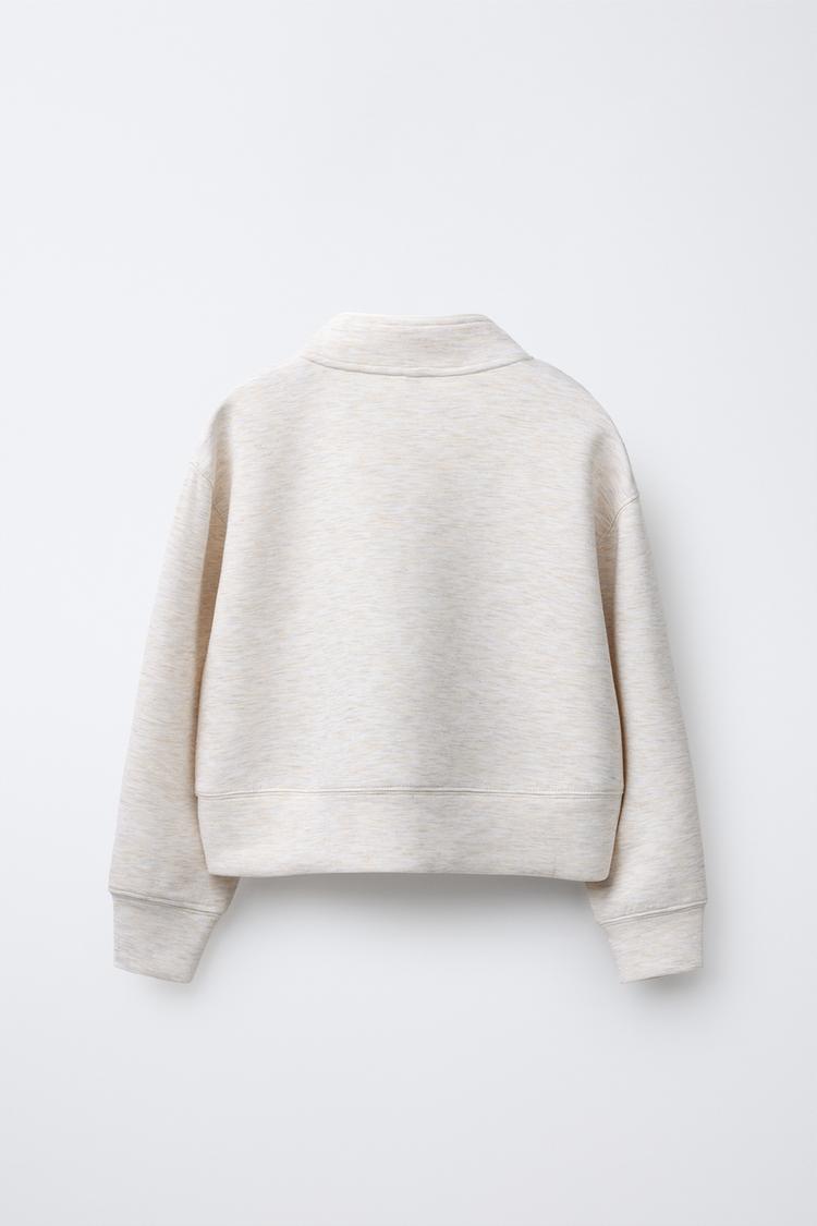 RAISED SLOGAN SWEATSHIRT