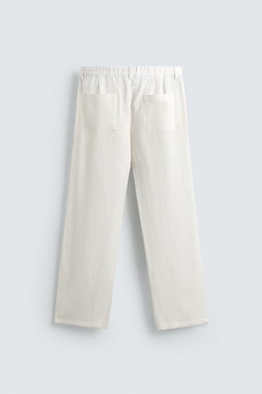 PANTALON COUPE DÉCONTRACTÉE EN VISCOSE ET CHANVRE - Blanc cassé de Zara - Image 6