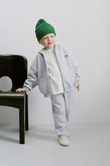 Zaras SWEATSHIRT MED DRAGKEDJA OCH TEXT - Gråmelerad