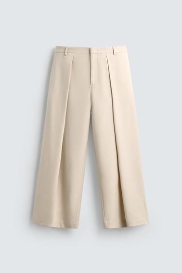 PANTALÓN DE PIERNA ANCHA CON PLIEGUES - Beige de Zara