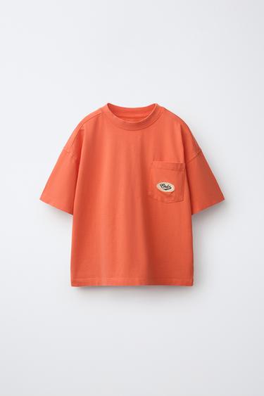 CAMISETA EFECTO LAVADO BOLSILLO LOGO BORDADO - Naranja de Zara - Imagen 0