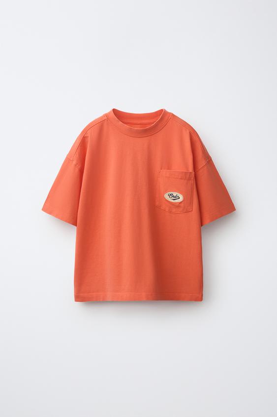 WASHED-EFFECT T-SHIRT WITH POCKET AND EMBROIDERED LOGO - Orange de Zara - Imagen 0