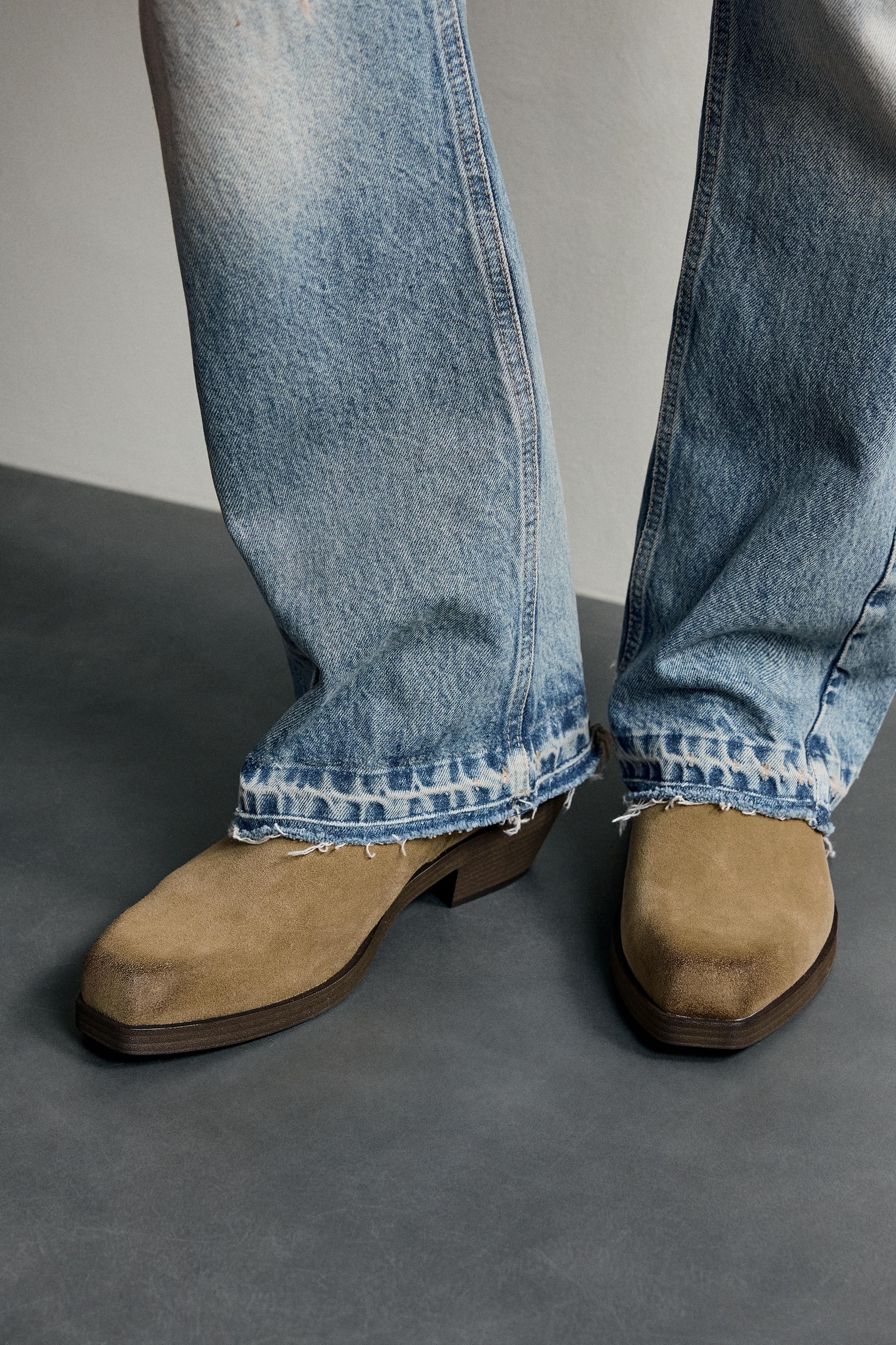 DISTRESSED LEATHER BOOTS
